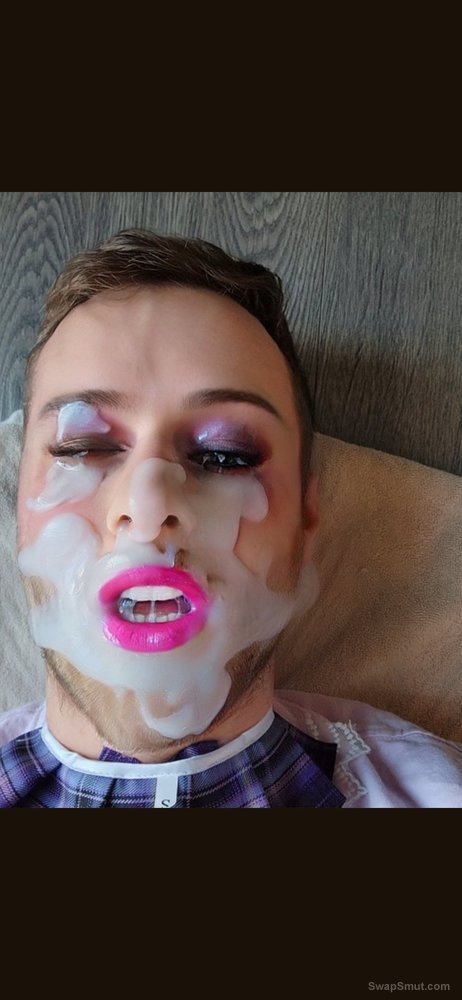 Sissy slut with pink lips takes huge cum load in mouth and all over face