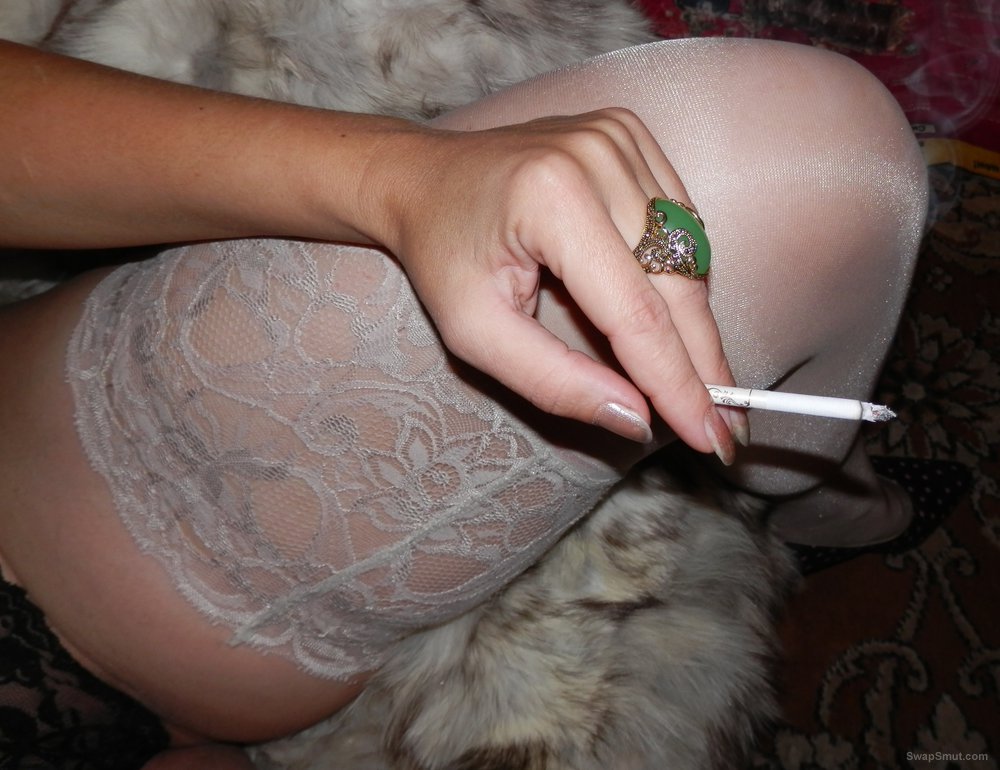 Some pictures of my mature wife with a cigaretes