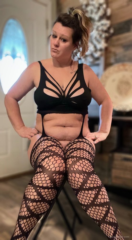 Sexy milfwife in black lingerie with toy