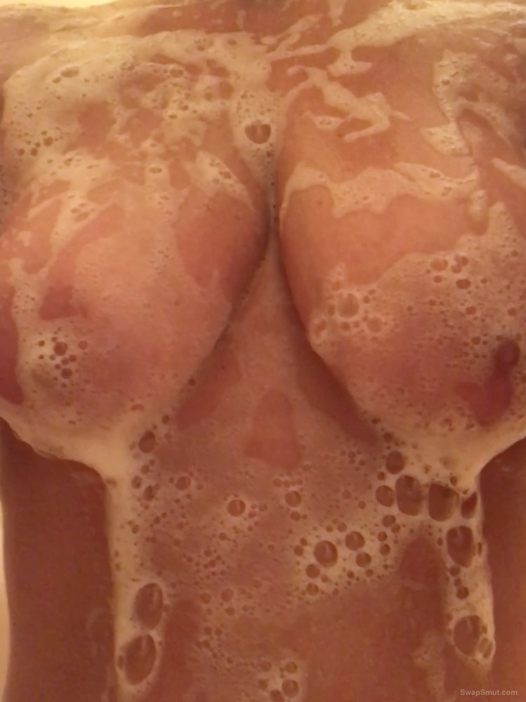 My beautifuls wife's tits while in the shower