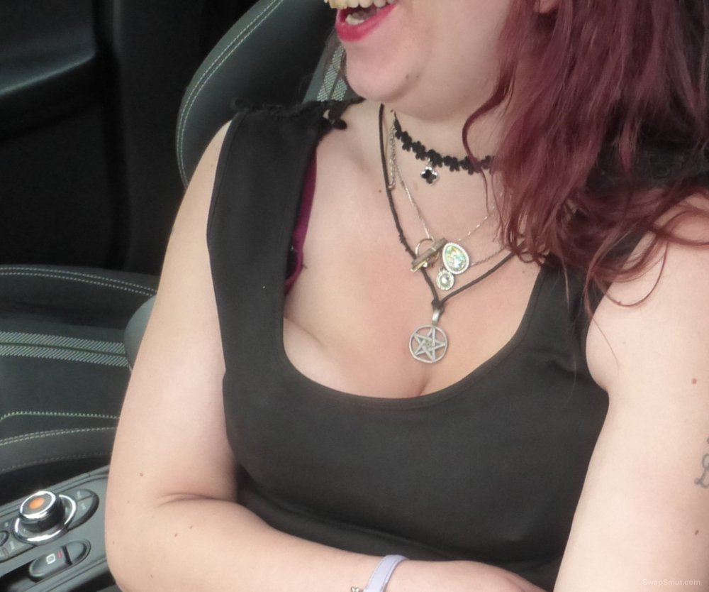 Having some fun in the car with this naughty young MILF