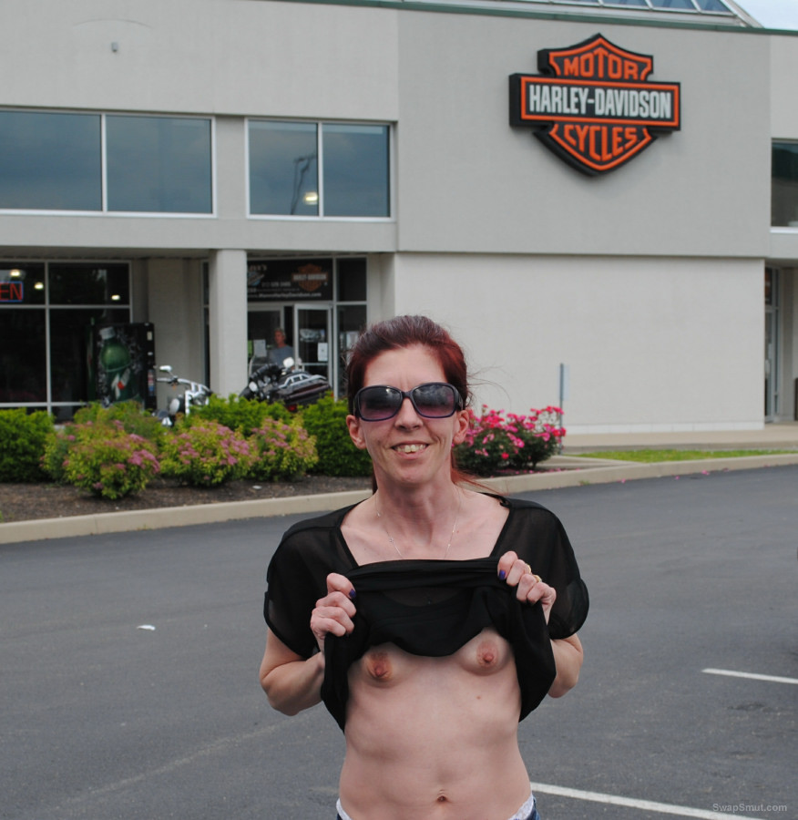 My little sexy wife flashing her tits at some landmarks and dealership pic image