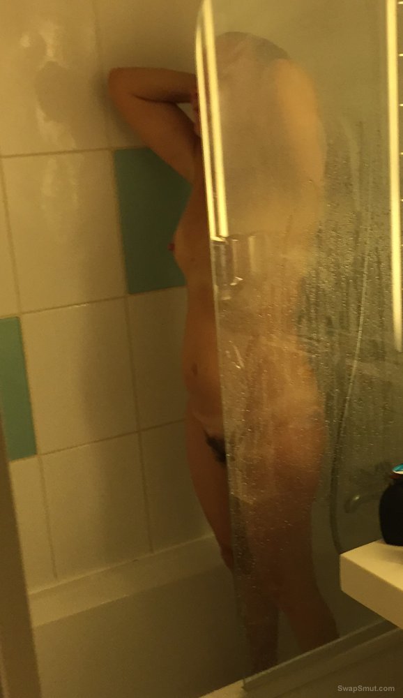 Fully Naked, taking a hot shower