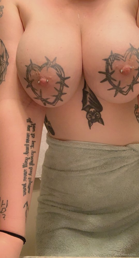 My huge tattooed and pierced tits image