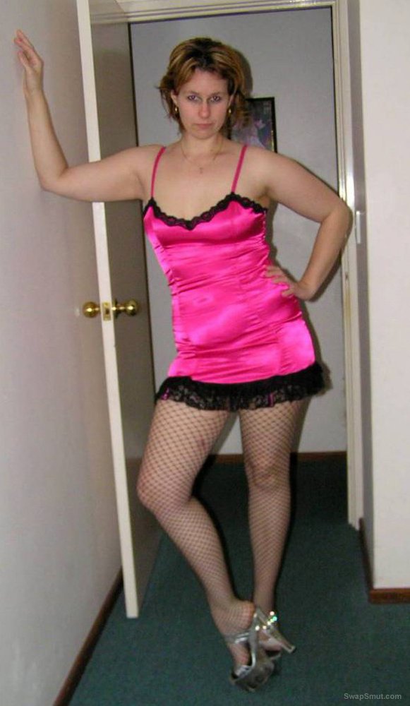 sexy housewife posing in sexy pink lingerie
