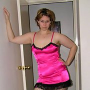 sexy housewife posing in sexy pink lingerie