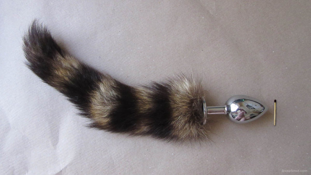 Me wearing my new raccoon tail hope you like