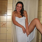 Lovely brunette amateur strip-tease in the shower