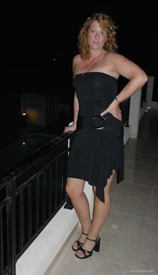 A stunning blonde wife loves to pose and tease